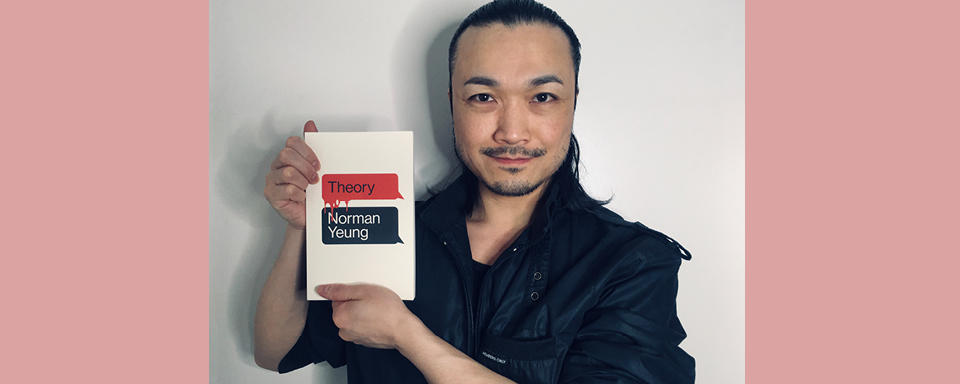 Norman Yeung holding Theory