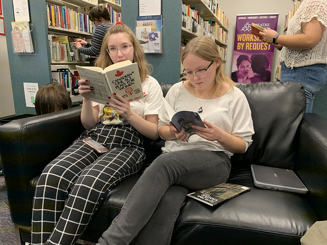 Students read at the Theatre Alberta Library